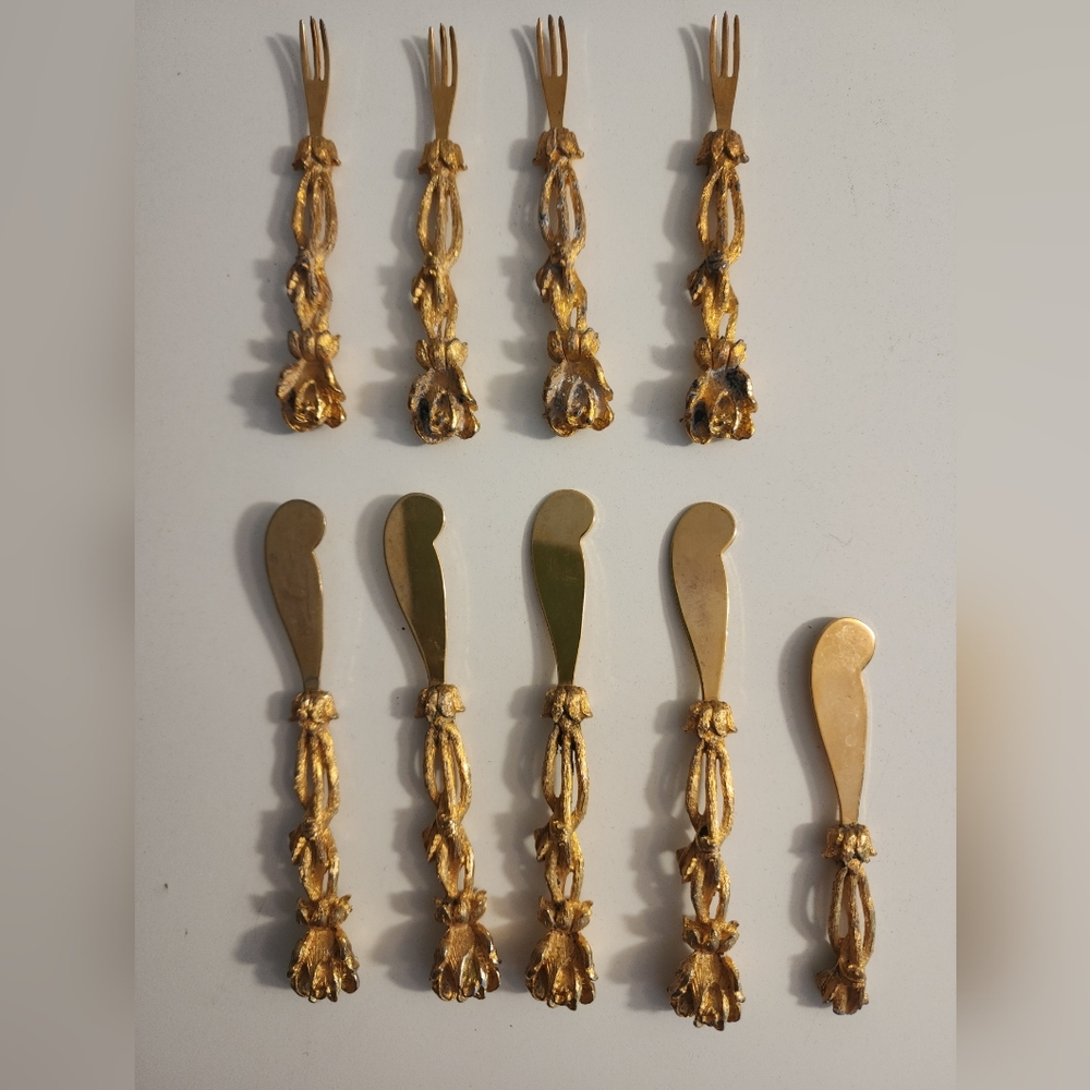 Vintage Janis 24K gold plated forks and spreaders.Set includes 11 pieces total